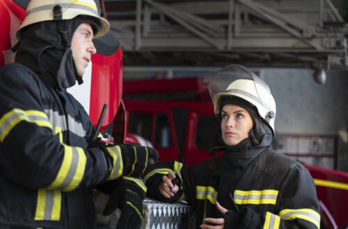 Fire Watch Security for Buildings and Worksites 5 male female firefighters working together suits helmets scaled 1